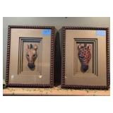 Giraffe and Zebra Masks in framed shadow boxes
