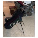 Golf clubs with Titleist golf bag