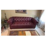 Red leather couch 7’ long