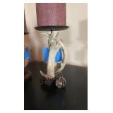 (2) Antler pillar candle holders with candles.