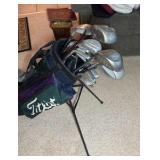 Golf clubs with Titleist golf bag