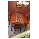 Dining wood table with 6 spindle back chairs L66” x D44” x H30”