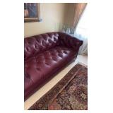 Red leather couch 7’ long