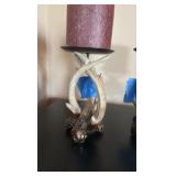 (2) Antler pillar candle holders with candles.