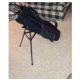Golf clubs with Titleist golf bag