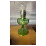 Antique Aladdin oil lamp, footed green base