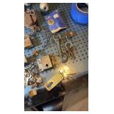 Assorted metal items. brass locks and keys etc.