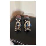 (2) Antler pillar candle holders with candles.