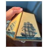 Vintage nautical-themed table lamp with doily