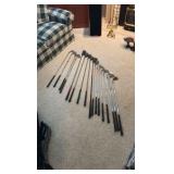 Golf clubs with Titleist golf bag