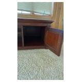Low-profile media cabinet.