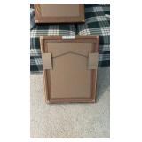 Giraffe and Zebra Masks in framed shadow boxes