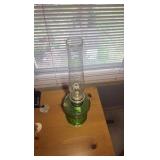 Antique Aladdin oil lamp, footed green base