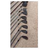 Golf clubs with Titleist golf bag