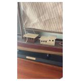 Mariner shelf-sitter and model of circa 1897 ship