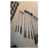 Golf clubs with Titleist golf bag