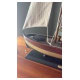 Mariner shelf-sitter and model of circa 1897 ship