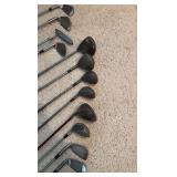 Golf clubs with Titleist golf bag