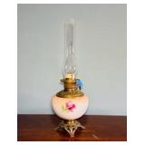 Antique oil lamp with handpainted base and chimney