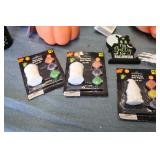 Box of halloween decorations and cr...