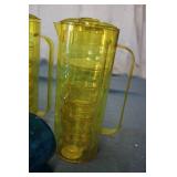 Pitchers with glasses...