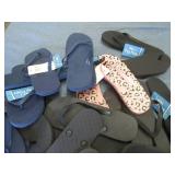 Lot of assorted flip flops...