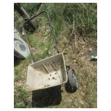 Manually operated fertilizer spread...