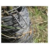 Spool of fence wire and 4ft sign po...