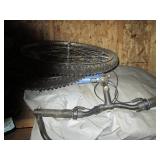 Contents of a shelf including tires, Huffy bike and more!