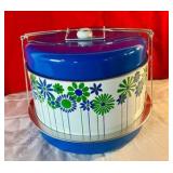 Vintage retro blue and white daisy tin cake container