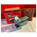 Vintage modern decor hand sewing machine with original container and box