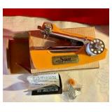Vintage small hand held sun sewing machine in original box