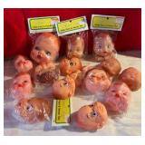 Group of 14 craft plastic baby faces & hands fibre craft