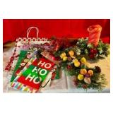 Group of vintage and newer christmas holiday decor and bags