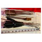 Large group of fondue forks wood handles