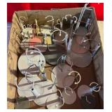 Large group of metal doll stands