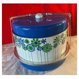 Vintage retro blue and white daisy tin cake container