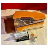 Vintage small hand held sun sewing machine in original box