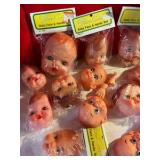 Group of 14 craft plastic baby faces & hands fibre craft