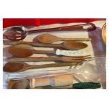 Vintage wooden salad forks and spoons and various utensils monkey pod