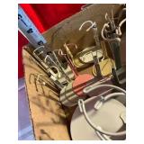 Large group of metal doll stands