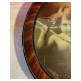 Vintage cupid awake lithograph by M. V. Parkinson in oval frame