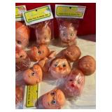 Group of 14 craft plastic baby faces & hands fibre craft
