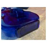 Collectable group of cello shaped cobalt blue glass bottles