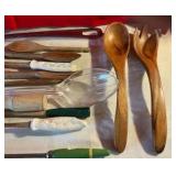 Vintage wooden salad forks and spoons and various utensils monkey pod