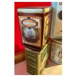 Group of 4 molasses candy, tea, cookie tins