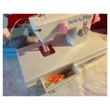 Pair of vintage plastic toy sewing machines Sew-N-Play, Rainbow girl