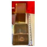 Group of 4 molasses candy, tea, cookie tins