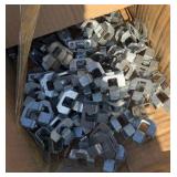 tote of nails, staples, strings, and ties