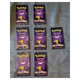 7 sealed packs of Pokemon trick or trade cards